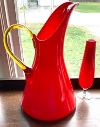 Lot 417- MCM Tall Orange Blown Glass Pitcher And Bud Vase - As Is