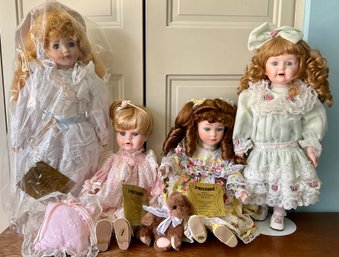 Lot 460- Seymour Mann Limited Edition Lot Of 4 Porcelain Dolls