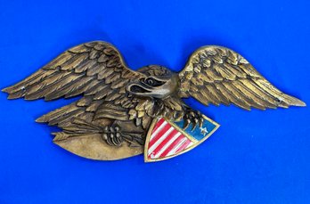 Lot 638 - Patriotic Vintage Metal American Bald Eagle Clutching Flag Emblem - 22 Inches USA Patriotism