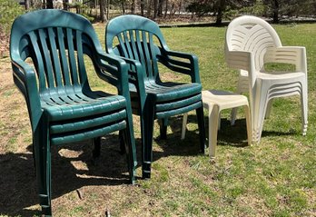 Lot 36- Green And White Plastic Patio Outdoor Chairs And Small Table- Lot Of 11