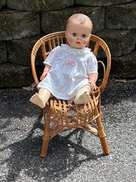 Lot 208- Baby Doll & Adorable Small Rattan Chair