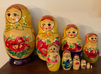 Lot 278- 10 Russian Nesting Dolls - LOOK AT THE TINY ONE!