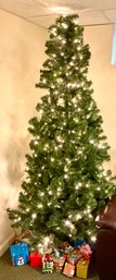 Lot 59- 7 Foot Tall Lighted Christmas Tree - Like New! With Fake Presents