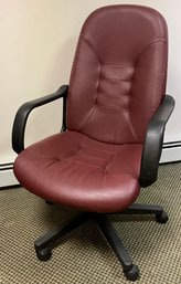 Lot 65- Leather Computer Desk Rolling Chair In Burgundy
