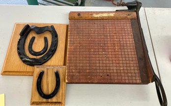 Lot 327- Milton Paper Cutter And 2 Mounted Horse Shoes Decor