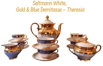 Lot 248- Seltmann White, Gold And Blue Demitasse Cup And Tea Pot  Set 9 Piece - Bavaria - Theresia