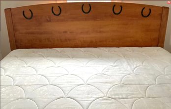 Lot 54- Western King Size Bed With Horseshoes Headboard - BRING HELP TO MOVE THIS!