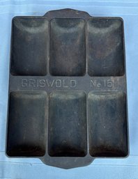 Lot 319 - Early 1900s Griswold No 16 Cast Iron 6 Cup French Roll - Cornbread Pan