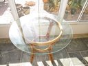 Rattan Honey Colored Glass Top Round Table