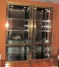 Brass, Glass Door Lighted Curio Cabinets With Smokey Mirrored Back - Set Of 2