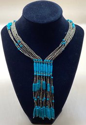 Turquoise Tassel Necklace With Brass Beaded Accents