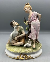 Vintage Bisque Porcelain Boy & Girl Figurine