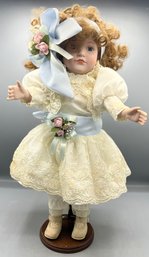 Bisque Porcelain Doll With Stand