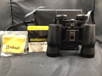 Black Bushnell Binoculars With Case And User Instructions