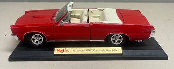 Maisto 1965 Pontiac GTO Hurst Edition 1/18 Scale Diecast Car With Plastic Base