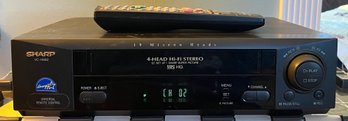 Sharp 4-head HI-FI Stereo VCR - Remote Included - Model VC-H982U