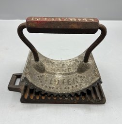 Antique Cast Iron Geneva Hand Fluter
