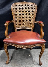 Cane Back Chair With Leather Seat And Hand Carved Floral Embellishments