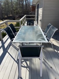 Aluminum Glass-Top Table With 6 Mesh-back Arm Chairs