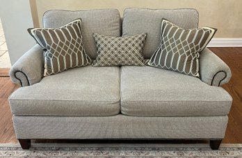 Bernhardt Furniture Cushioned Studded Loveseat With Throw Pillows