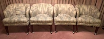 Mid Century Modern Upholstered Lounge Chairs With Castor Wheels- 4 Piece Lot