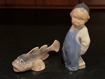 Royal Copenhagen Porcelain Boy And Fish Figurines - 2 Pieces