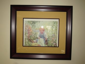 Boy In Garden Framed Print