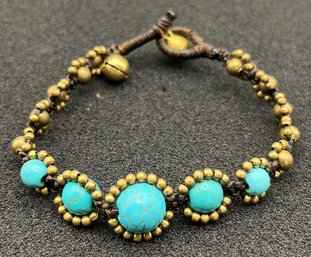 Blue And Gold Tone Beaded Rope Bracelet