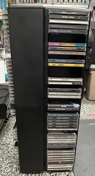 Assorted Lot Of CDs And CD Rack