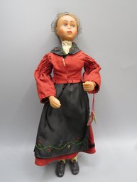Doll With Red, Black Dress
