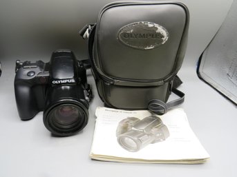 OLYMPUS IS-1 QUARTZDATE 35mm CAMERA W/35-135mm ZOOM LENS With Carry Bag & Instruction Booklet