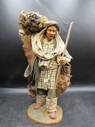 Man With Walking Stick Figurine