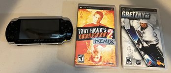 Sony PlayStation PSP-1001 Portable Console, Tony Hawk's Underground 2 Remix & Gretzky NHL 06 Game - 3 Pieces