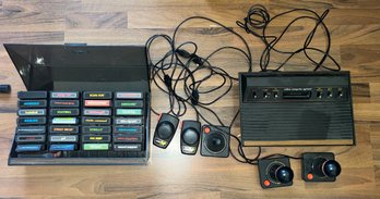 Atari Gaming Console With Controllers, Paddles And  28 Games With Storage Case