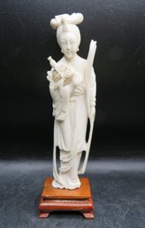 Asian Resin Figurine On Wood Base