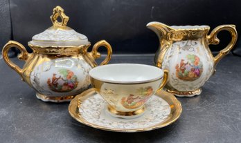 Veritable Porcelain Teacup And Saucer, Sugar Bowl And Creamer