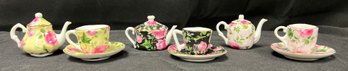 Ceramic Miniature Teapots And Saucers, 9 Piece Lot