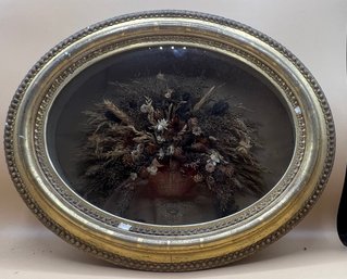 Oval Frame Of Dried Flowers With Name Lizzie On Plaque