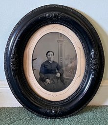 Antique Portrait In Oval Frame