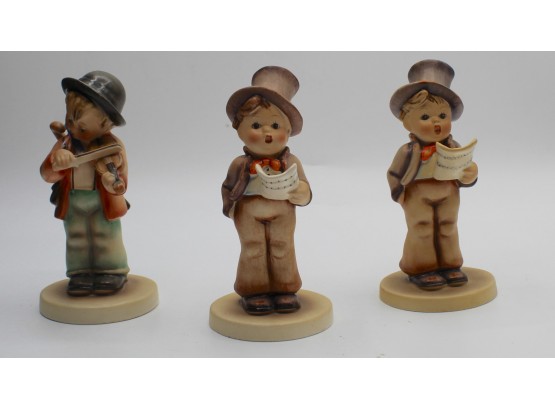 Hummel #60 'Little Fiddler', #131 'Little Boy Caroler' & #131 'Little Boy Caroler' Figurines