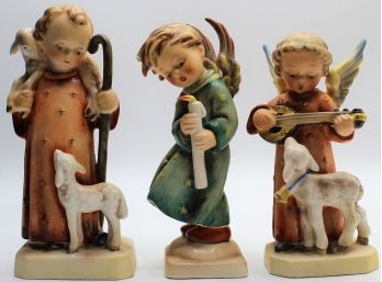 Hummel #42/0 'Good Shepherd', #83 'Angel Serenade With Lamb' & #21/0 'Heavenly Angel' Figurines