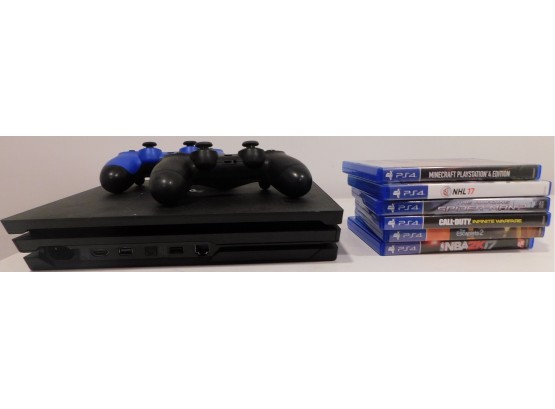 Play Station 4 (PS4) Console With 2 Controllers And Assorted Games