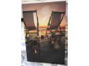Beach Chairs With Oil Lamps On Beach At Sunset, Canvas Art - Battery Operated
