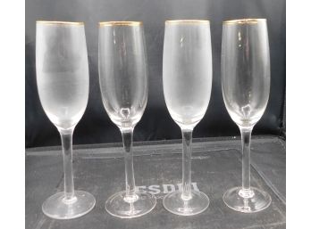 Set Of Flute Champagne Glasses With Gold Rim