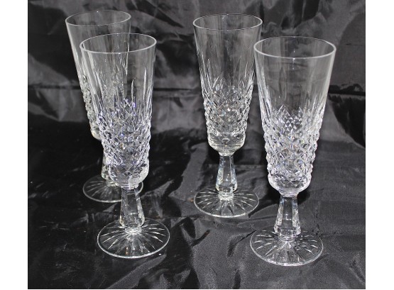 4 Waterford Champagne Flutes