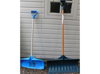 Pair Of Plastic Snow Shovels