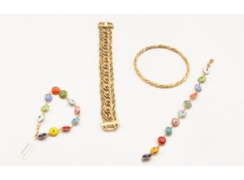 Lot Of 4 Pieces Of Costume Jewelry - 2 Evil Eye Multi Tone Enamel Bracelet - 2 Faux Golden Bracelets