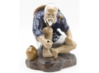 Crouching Japanese Fisherman Glazed Ceramic Figurine - Missing Fishing Poll