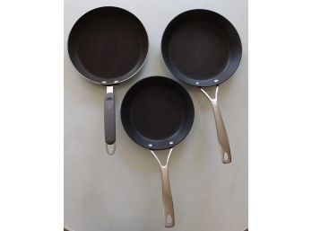 Set Of Three Pans With Handles