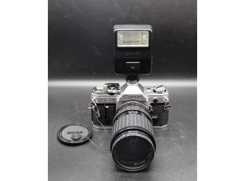 Vintage AE-1 Canon Camera In Great Working Condition. It Comes With Two Lenses, Flash,  And Carrying Case